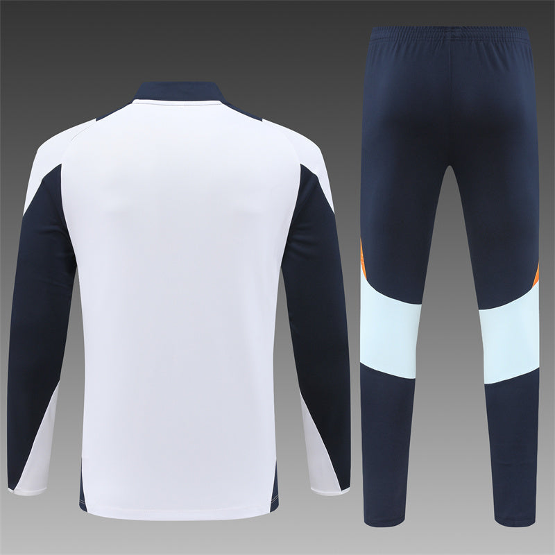 Real Madrid Tracksuit – White/Orange KIDS