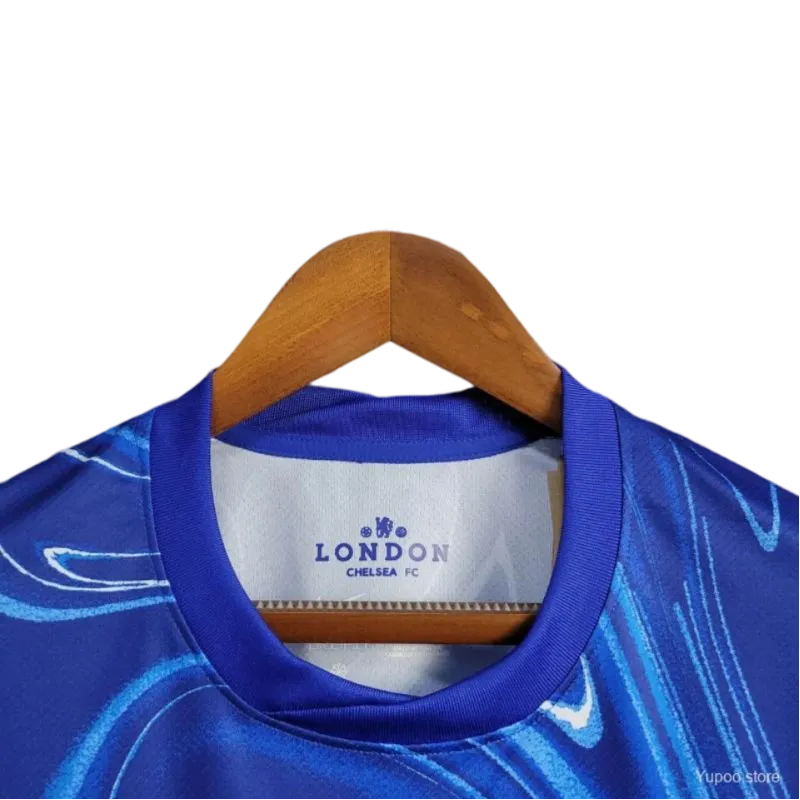 Equipamento Casa Chelsea 24/25