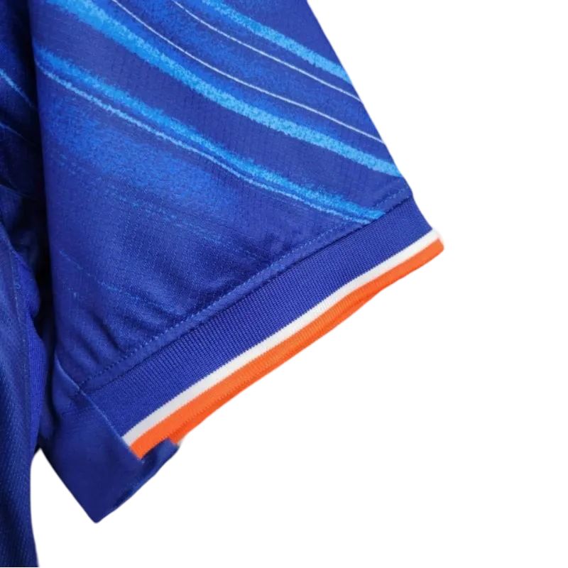 Equipamento Casa Chelsea 24/25